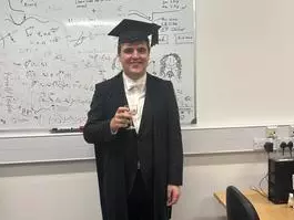 Joe in his academic dress