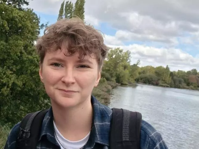 Cat O'Rourke by a river